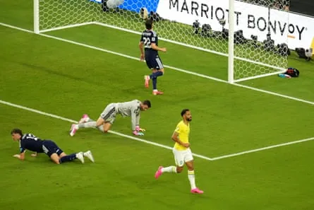 Brazil’s Matheus Cunha (right) celebrates after scoring Brazil’s third